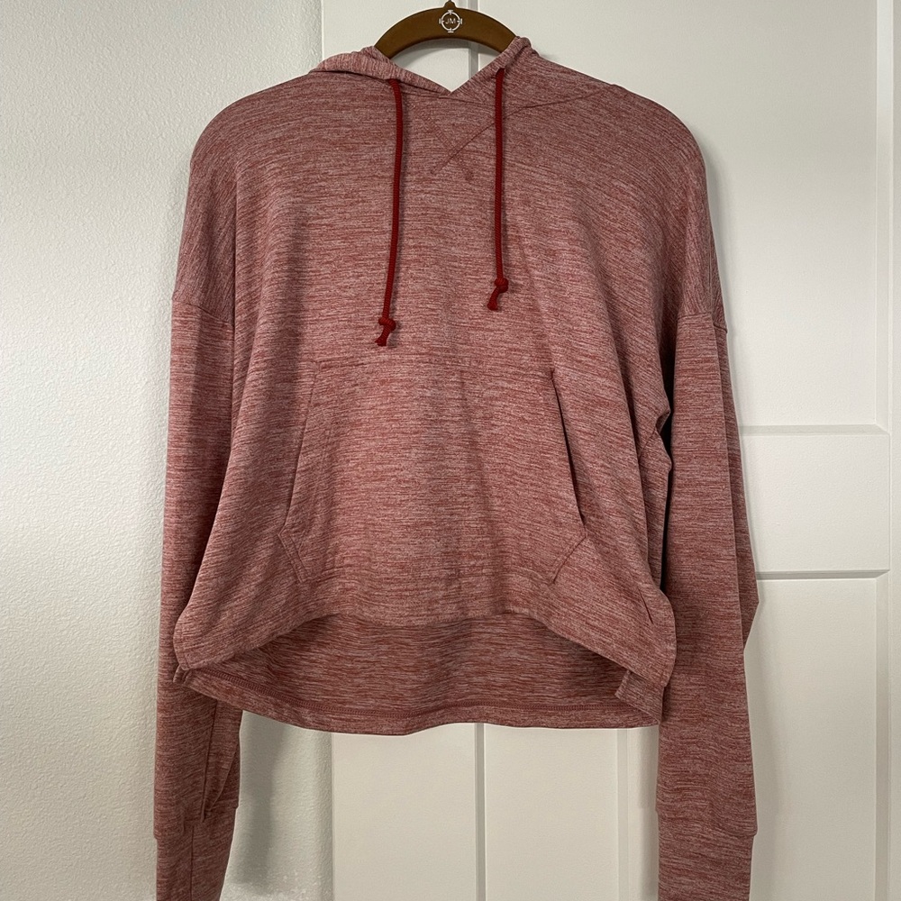 Coral colored Nike Dri-fit hooded sweat shirt.